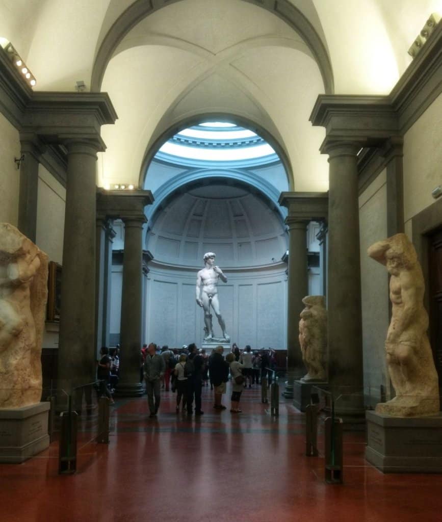 View of Michelangelo's David down the main gallery of the Accademia.