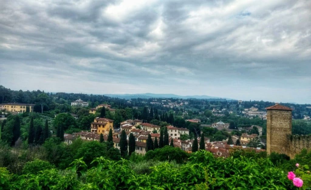 View of the Tuscan countryside around Florence, Italy, with overcast sky.