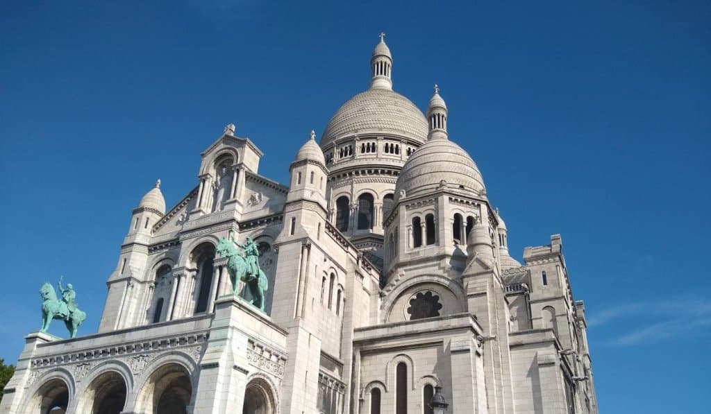 Basilica Sacre Coeur in Paris with a blue sky