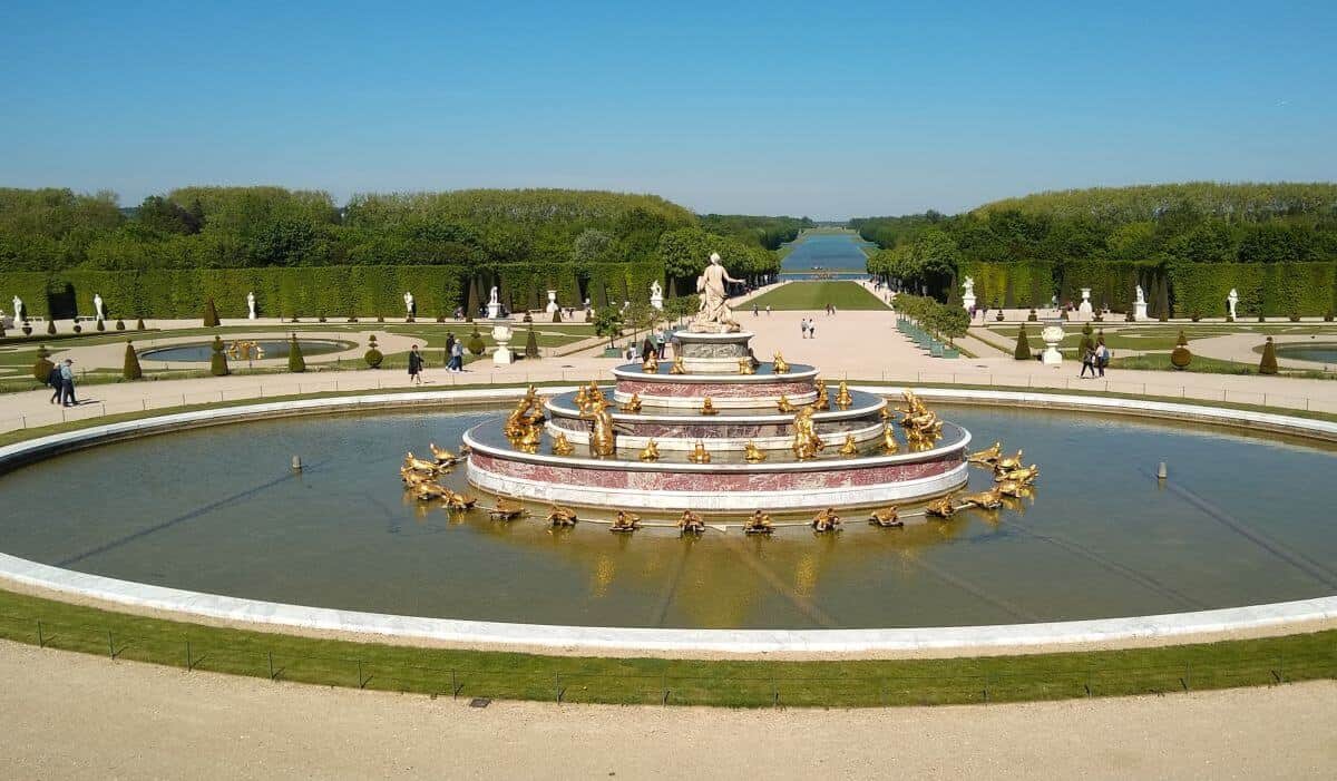 Large fountain at the gardens in Versailles