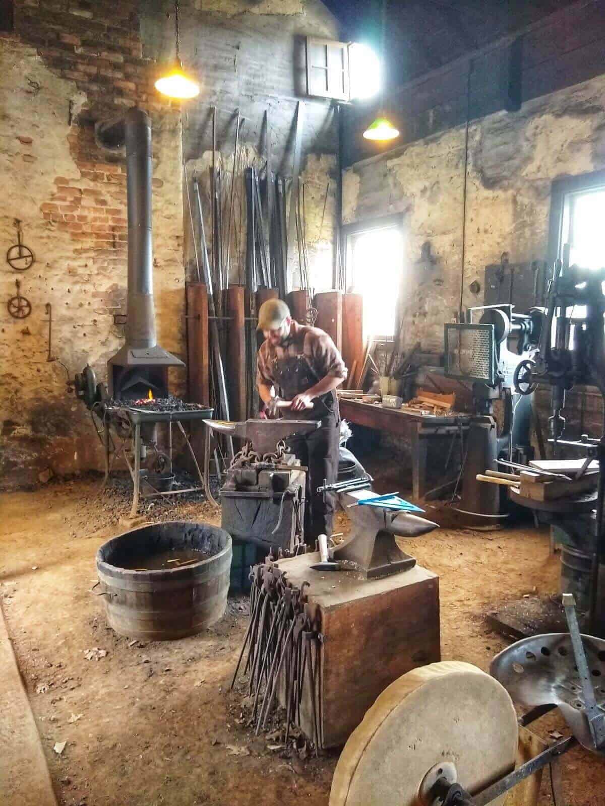 Blacksmith demonstrating with an anvil