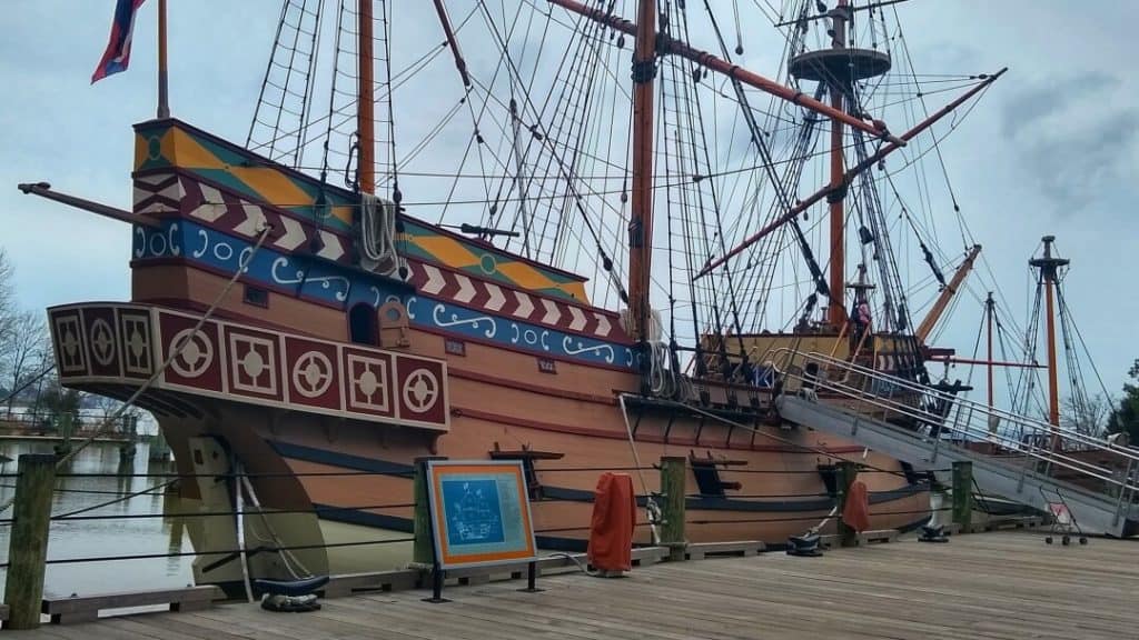 Replica 17th century ship on a pier.