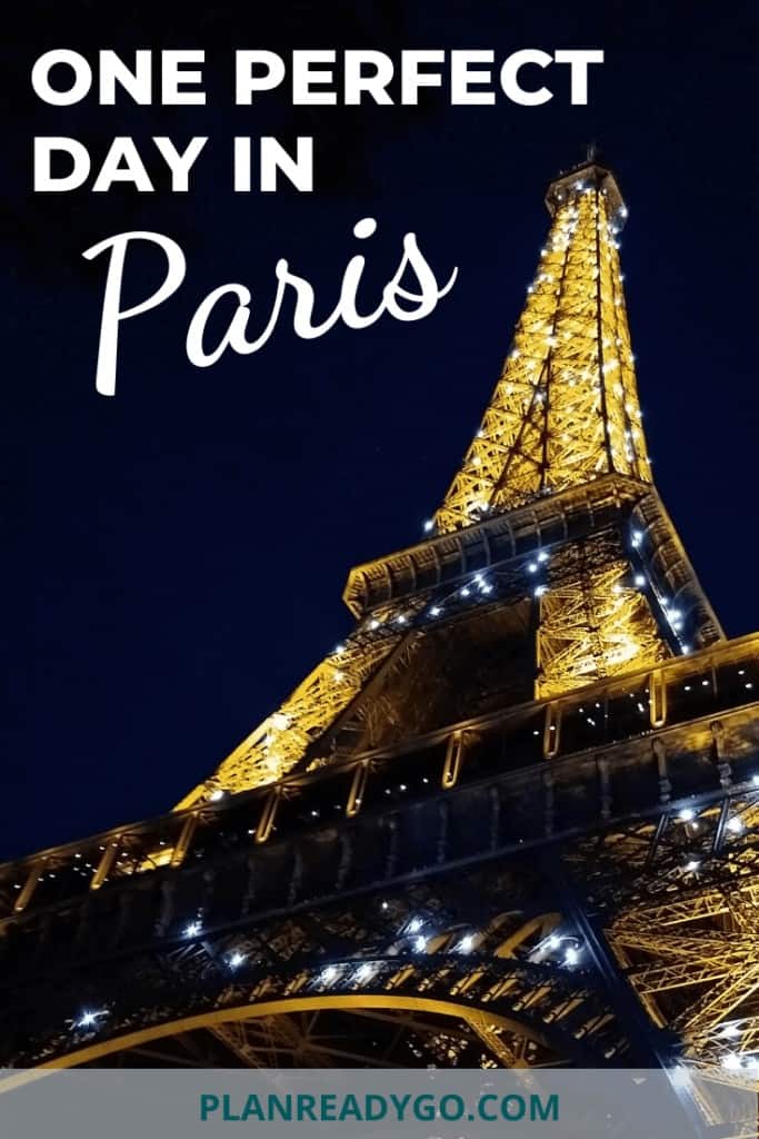 Eiffel Tower lit up at night from below with text overlay that says 1 perfect day in Paris.