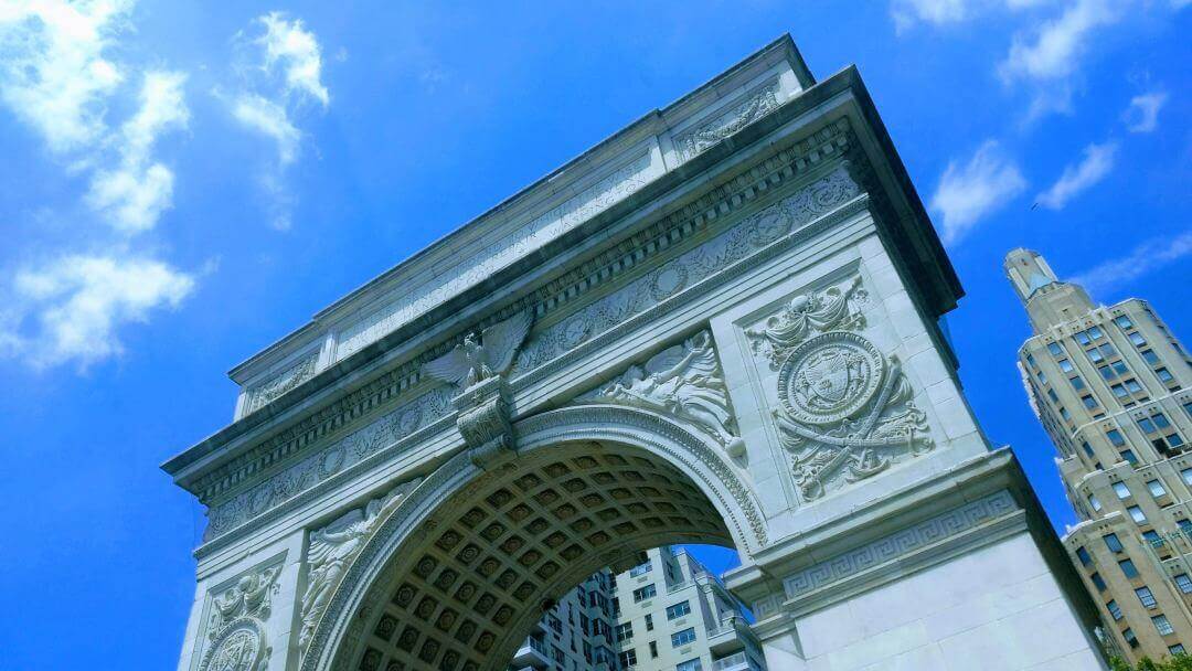 View of Washington Square arch from below.