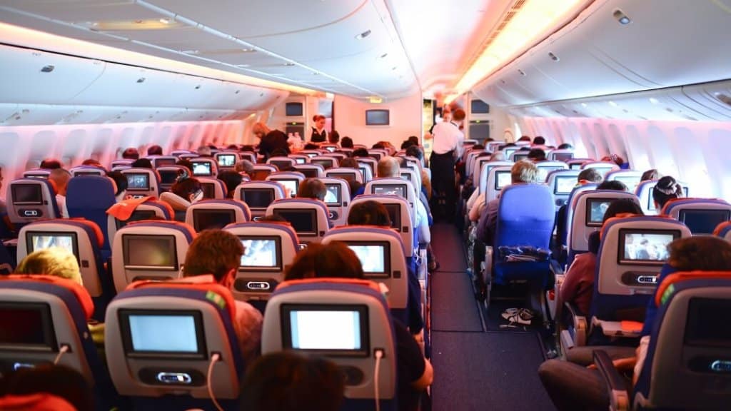 Airplane interior with passengers