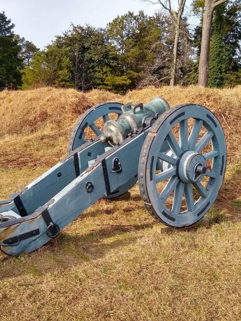 An American Revolution cannon on a battlefield