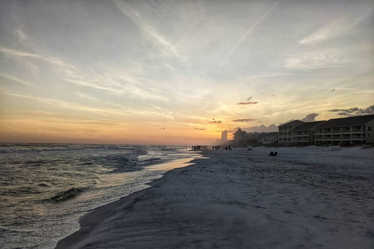 sunset over a sandy beach