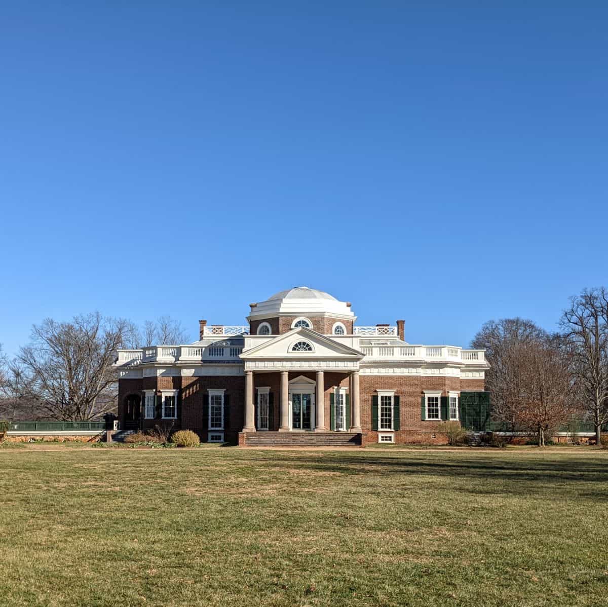 large brick house with a domed roof