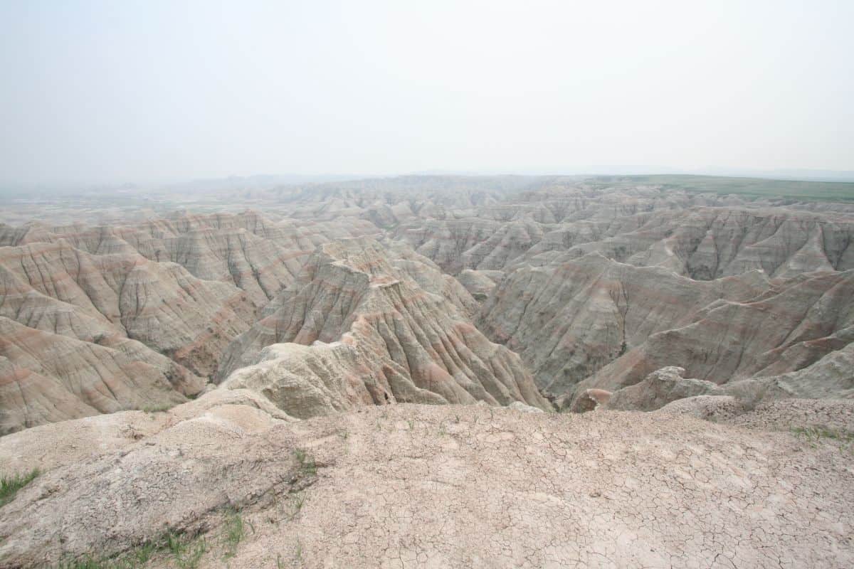 view of red-striped badlands rock formations