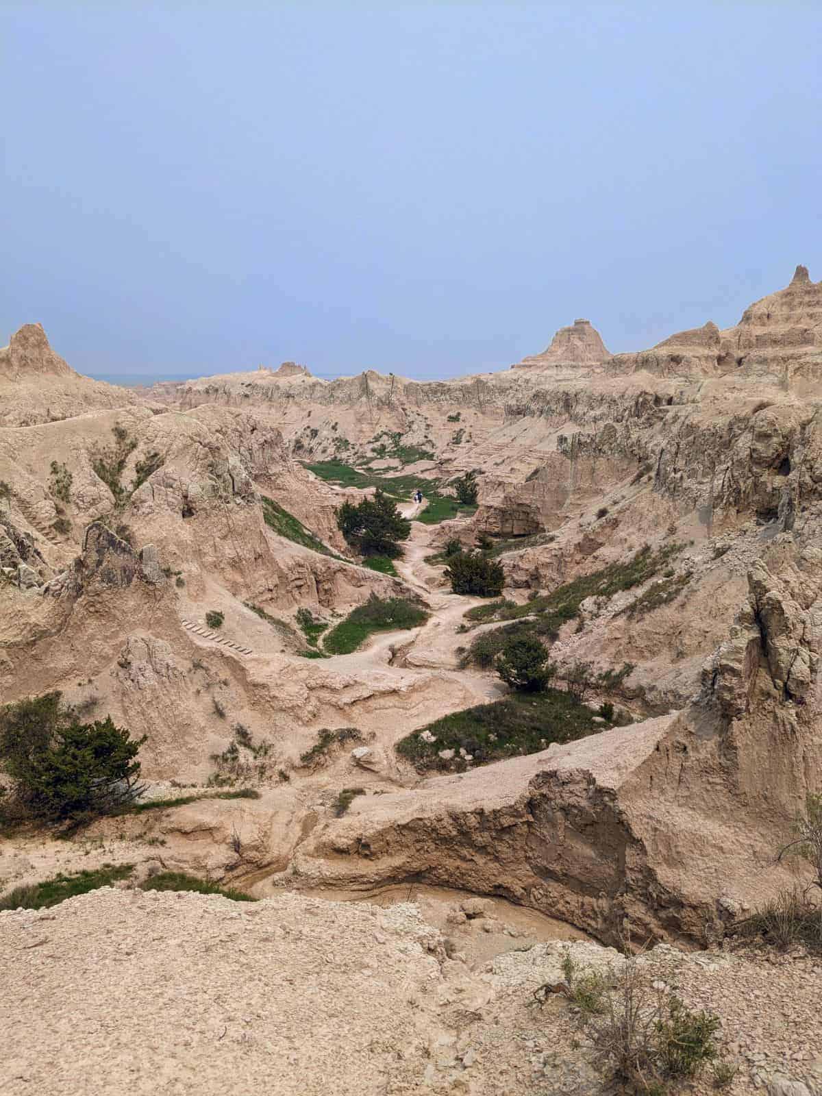 View of lower Notch hike area and ladder from the hike cliff path in Badlands National park