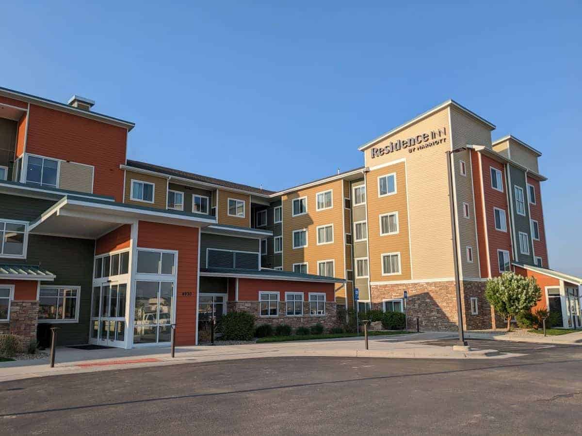 front of a Residence Inn hotel with blue sky
