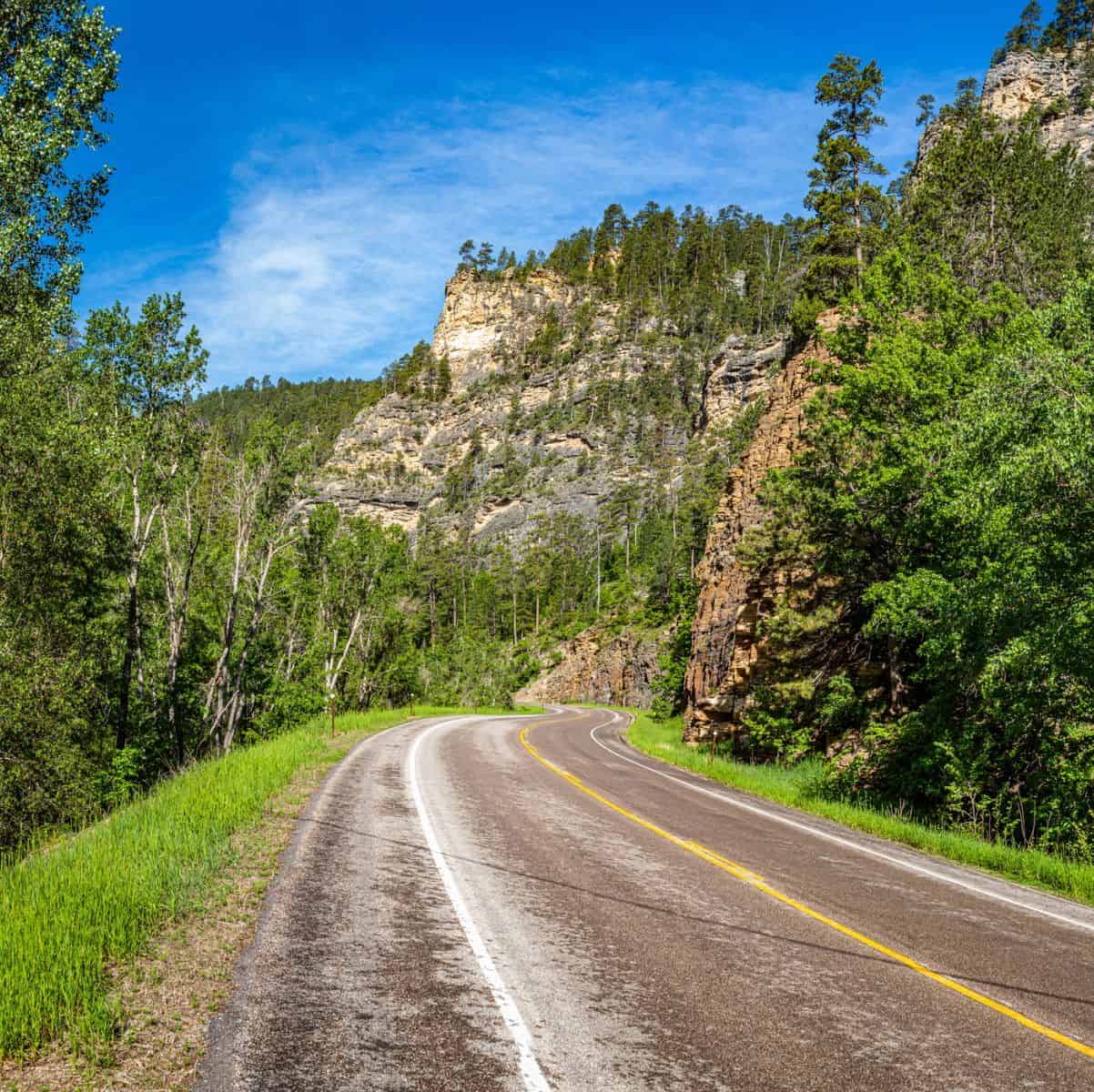 road winding through limestone canyon walls