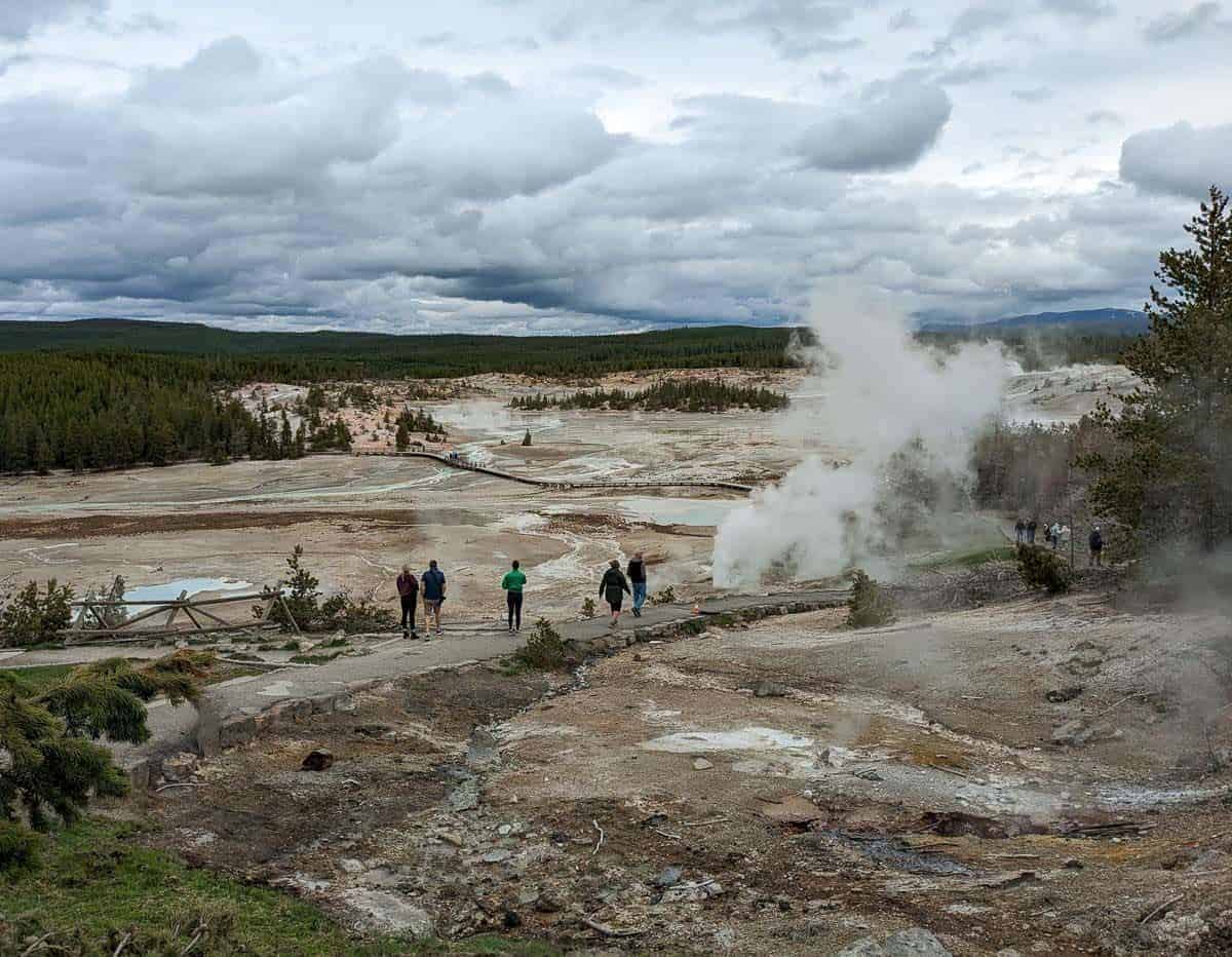 Overlooking a large area of geothermal features including many steam vents.