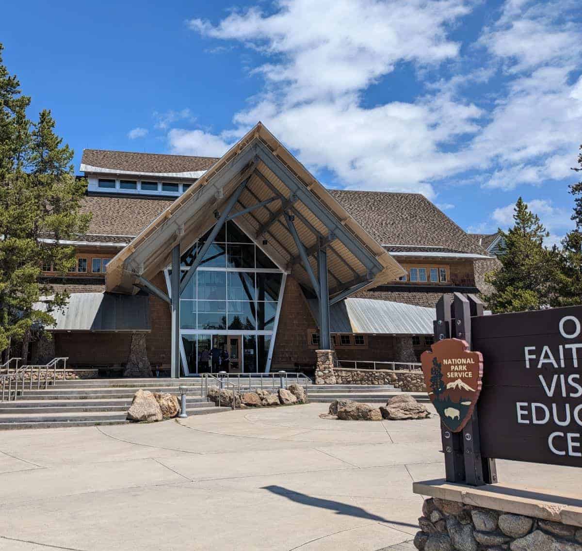 Wood, stone and glass visitor center building.